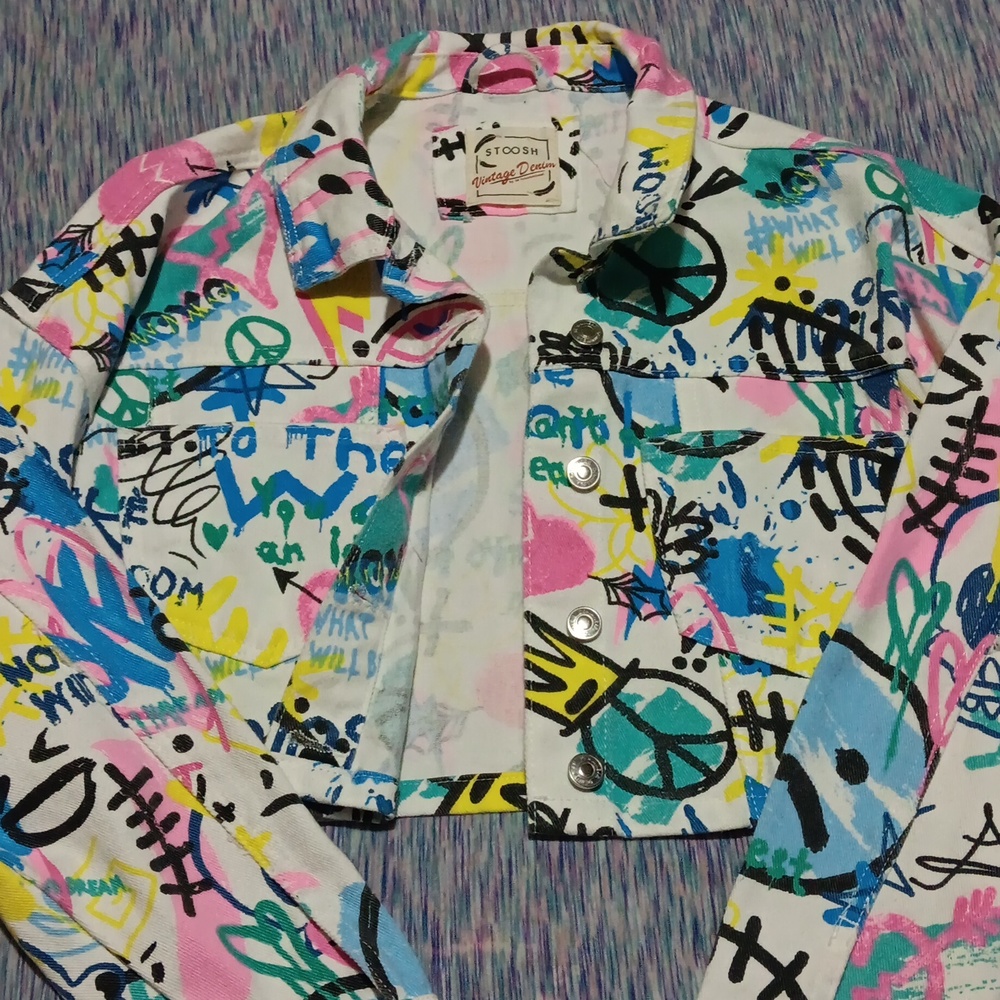 A cropped multicolored stoosh vintage denim jacket